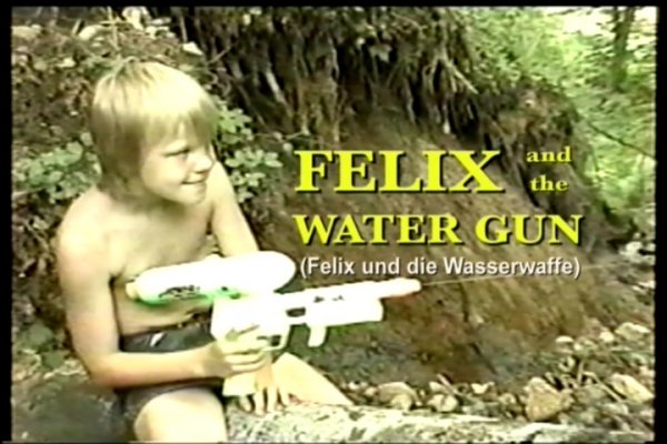 Felix and the Water Gun (family nudism, family naturism, young naturism, naked boys)