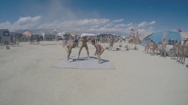 Naked oil wrestling at Burning Man 2015